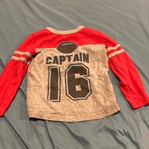 Red and grey long sleeve shirt